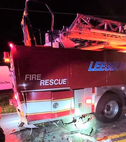 Speeding vehicle slams into parked Leesburg fire engine at crash scene