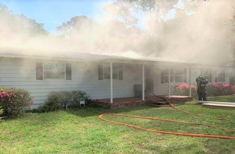 Leesburg firefighters battle blaze at home after flames spread into attic