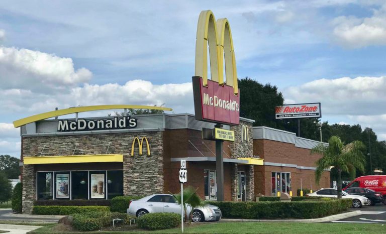 Naked man arrested at McDonalds after taking bite out of police
