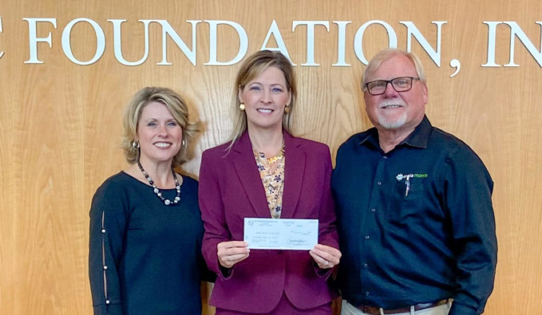 Tim Morris of Ernie Morris Enterprises right presents his 20000 gift to Dr. Laura Byrd of the LSSC Foundation center and Dr. Heather Bigard LSSC Provost and Executive Vice President.