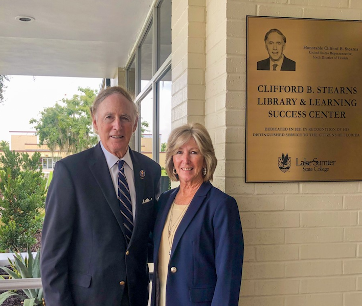 Congressman Stearns and his wife Joan pose for a picture next to the plaque unveiled today on the Leesburg Campus.