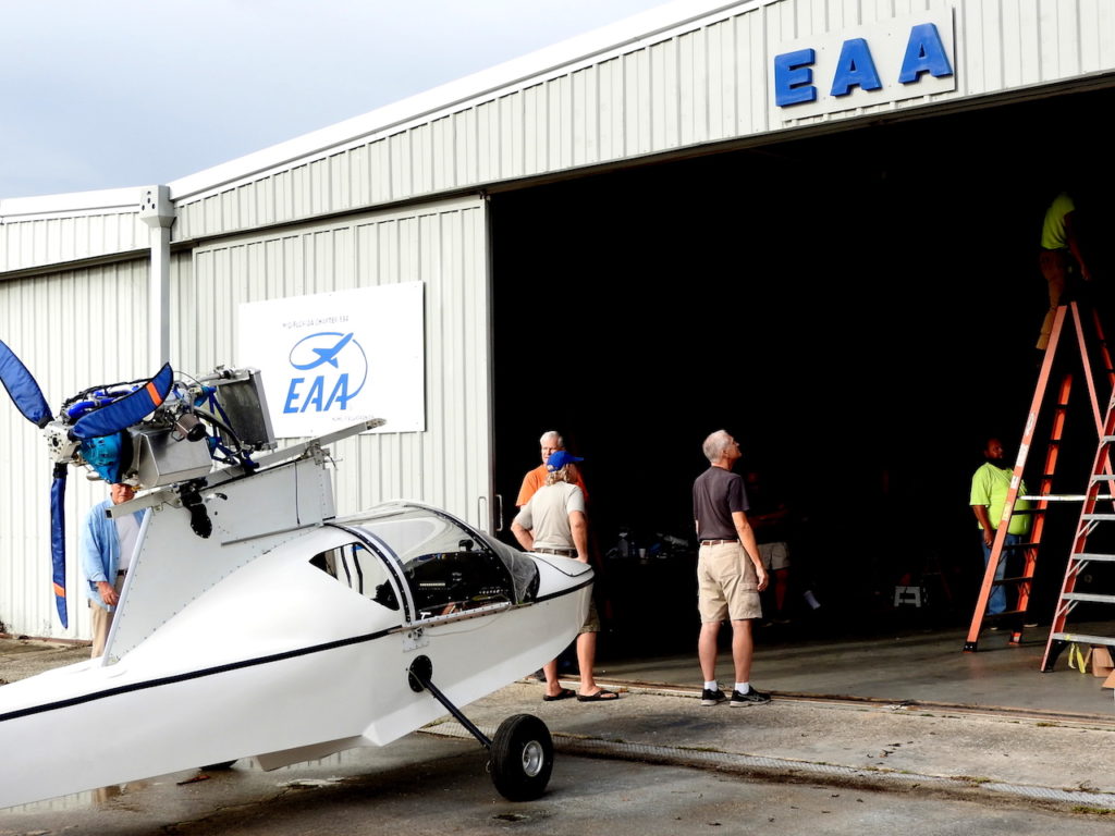 The SeaRay was moved outside and work tables in the hangar were moved around to make room for the tall ladders