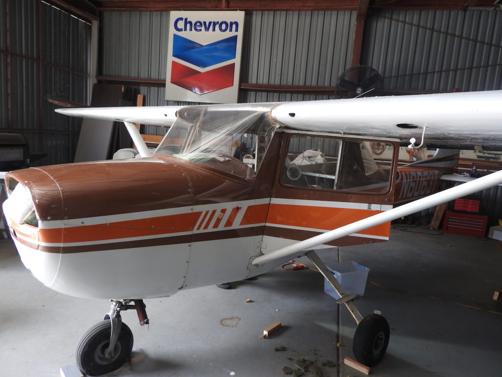The donated Cessna 150D minus its engine that was removed to be overhauled. The overhaul has now been completed creating a zero time engine that is about to be reinstalled.