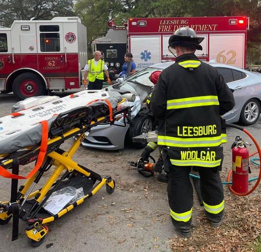 Leesburg firefighters extricated an injured person from a car Monday morning after a crash on County Road 468.