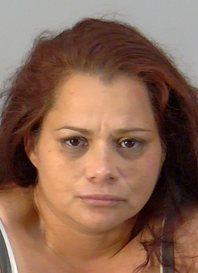 Texting driver jailed after heroin found under her seat