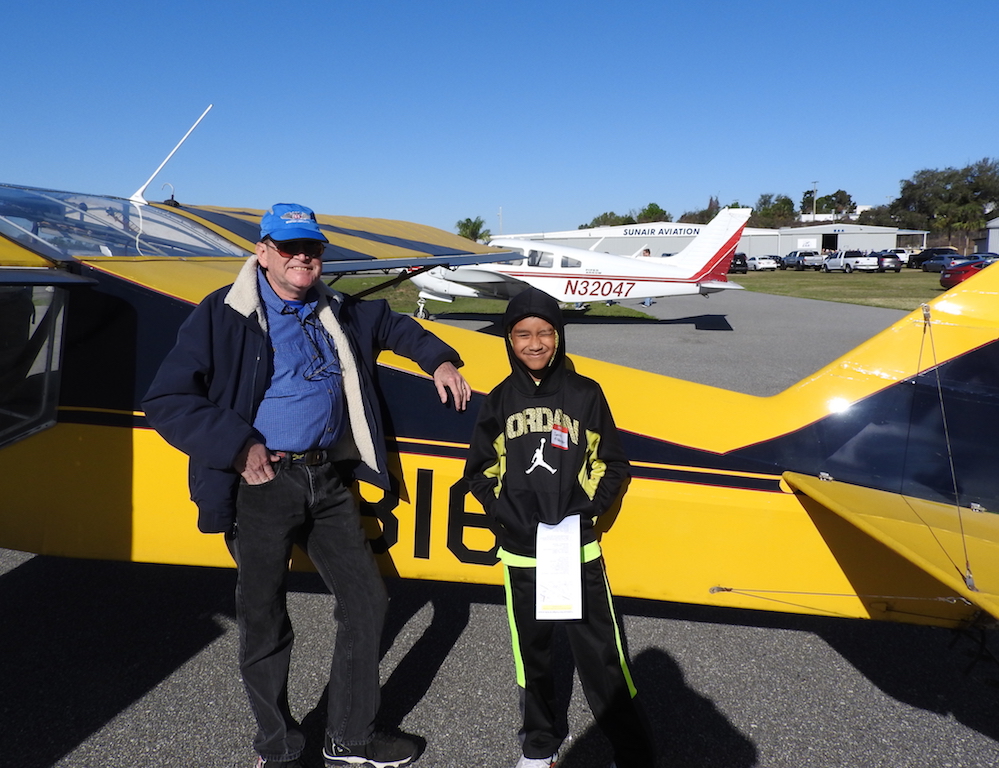 EAA Chapter 534 pilot and chapter VP John Weber and his Young Eagle crew member Savine Alexander get ready for takeoff.
