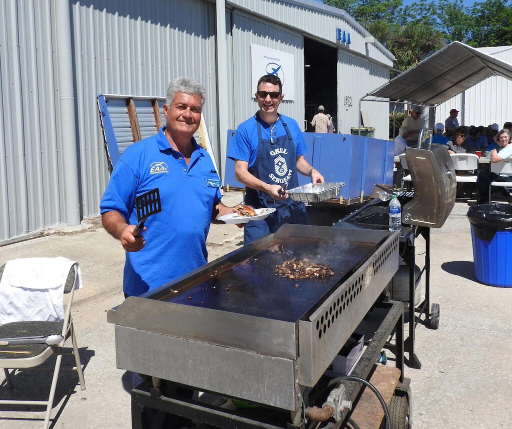 Tony Lucchese and David Hopkins from left were the skilled chefs working two grills.