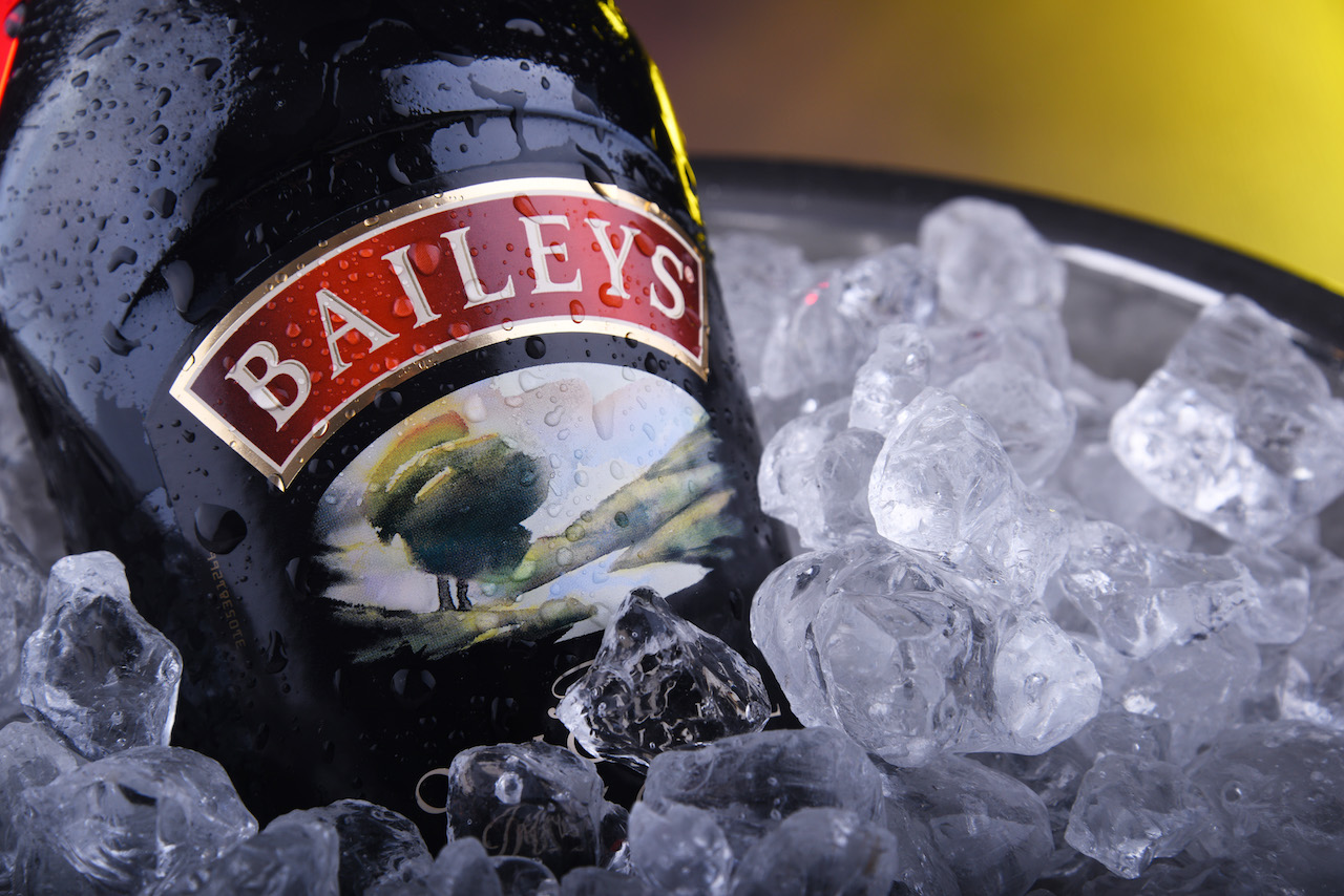 Bottle of Baileys Irish Cream in bucket with crushed ice