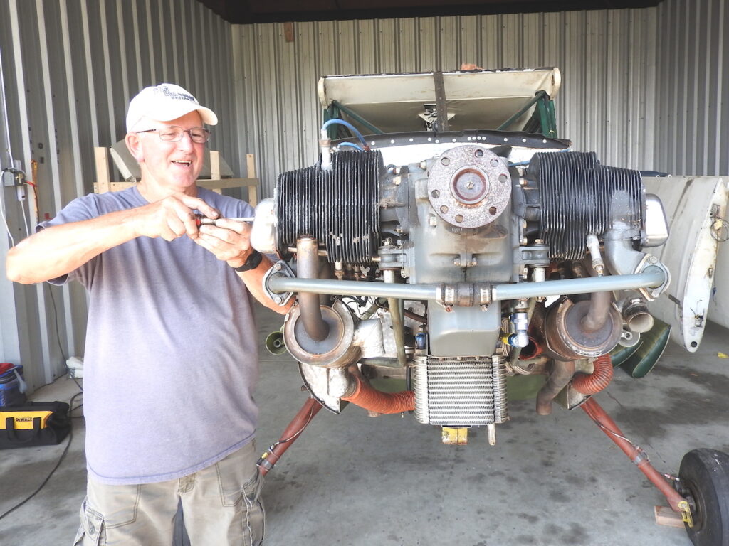 Bob Pitzer, one of several of the chapter’s aircraft mechanics, starts work on the Fairchild engine. Bob Pitzer, one of several of the chapter’s aircraft mechanics, starts work on the Fairchild engine.