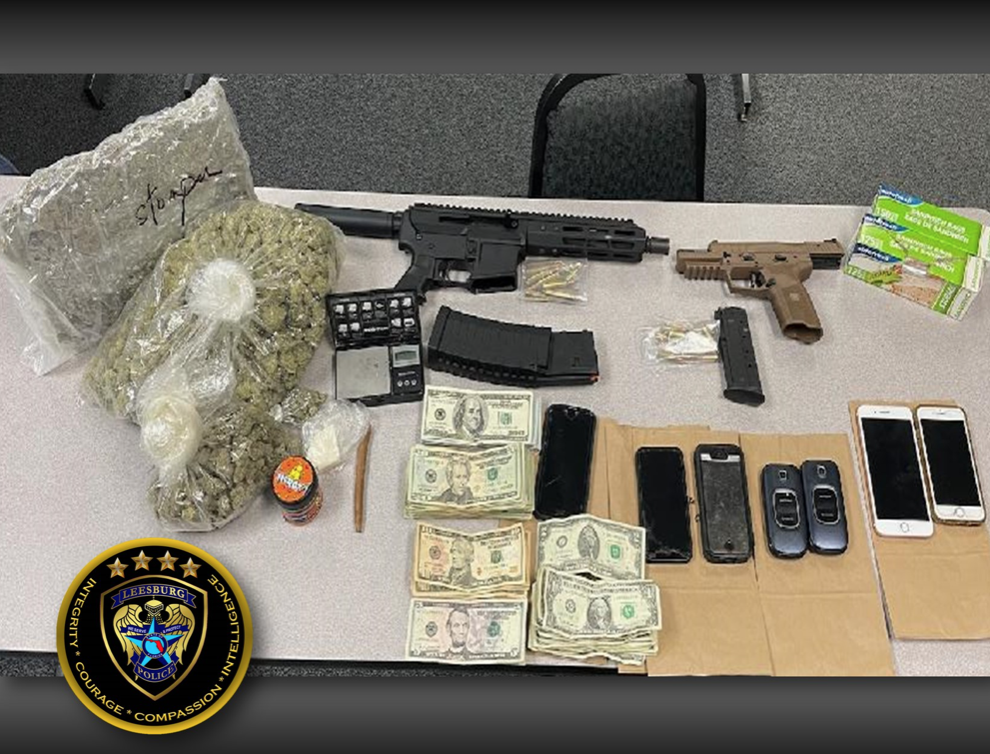 Weapons, drugs and money were seized in the raid