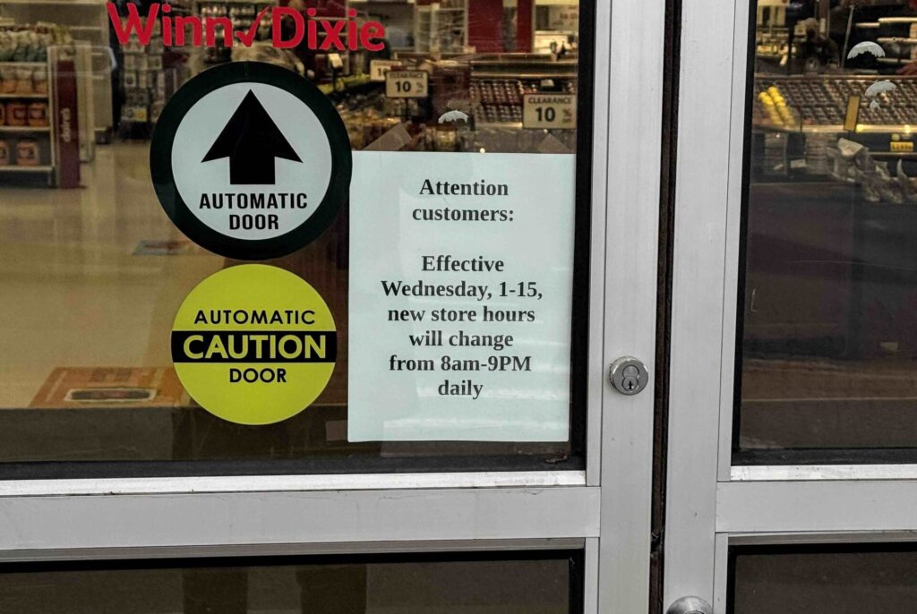 Decreasing hours sign on Winn-Dixie