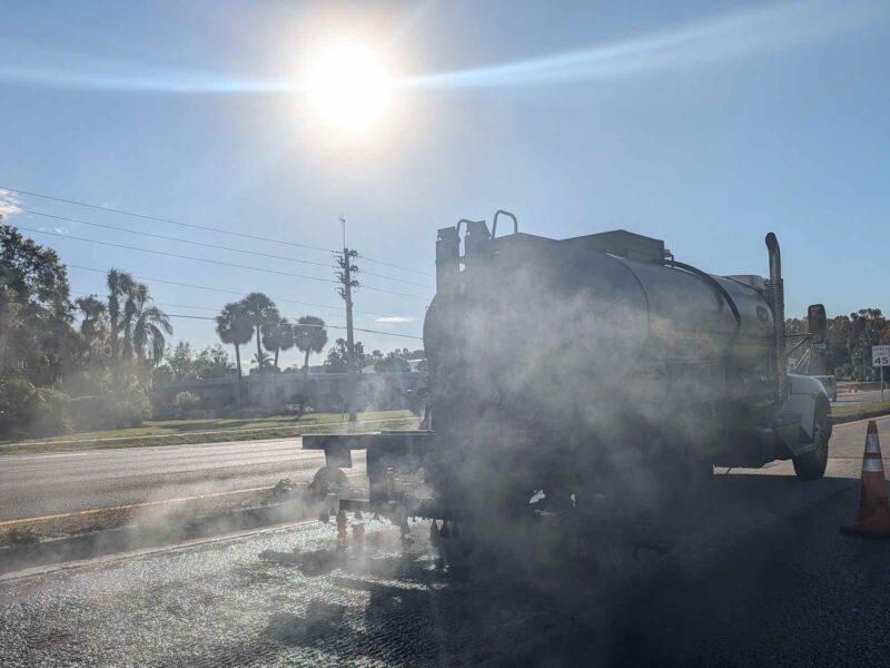 Crews working on behalf of the Florida Department of Transportation lay down new pavement on U.S. Highway 27 in Leesburg on Monday, December 22.