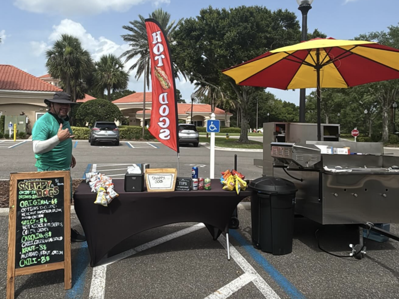 SnappyDogsFl operates a hot dog cart in Florida